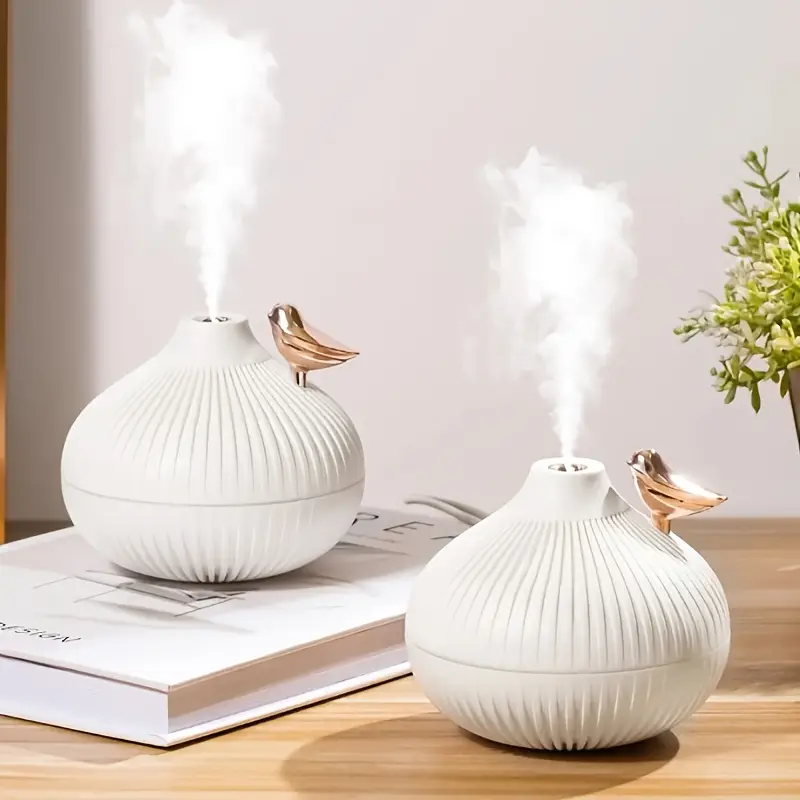 Elektrischer Aroma Diffusor mit Beleuchtung & rosegoldenem Vogel – Bild 2